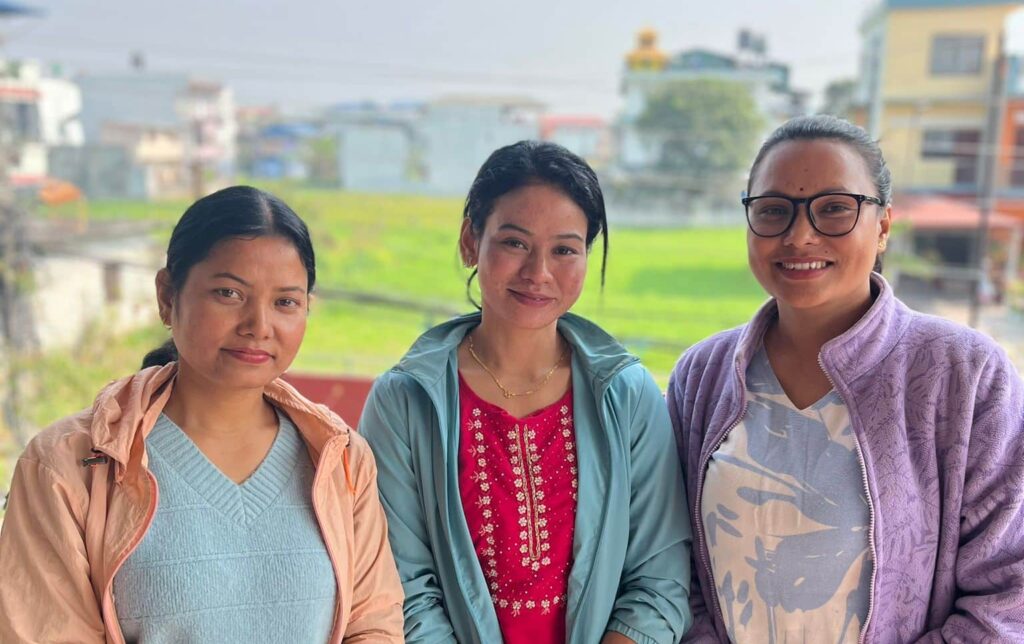 Three social mobilisers in Nepal