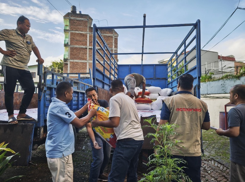 ActionAid in action in Nepal, delivering necessary items.